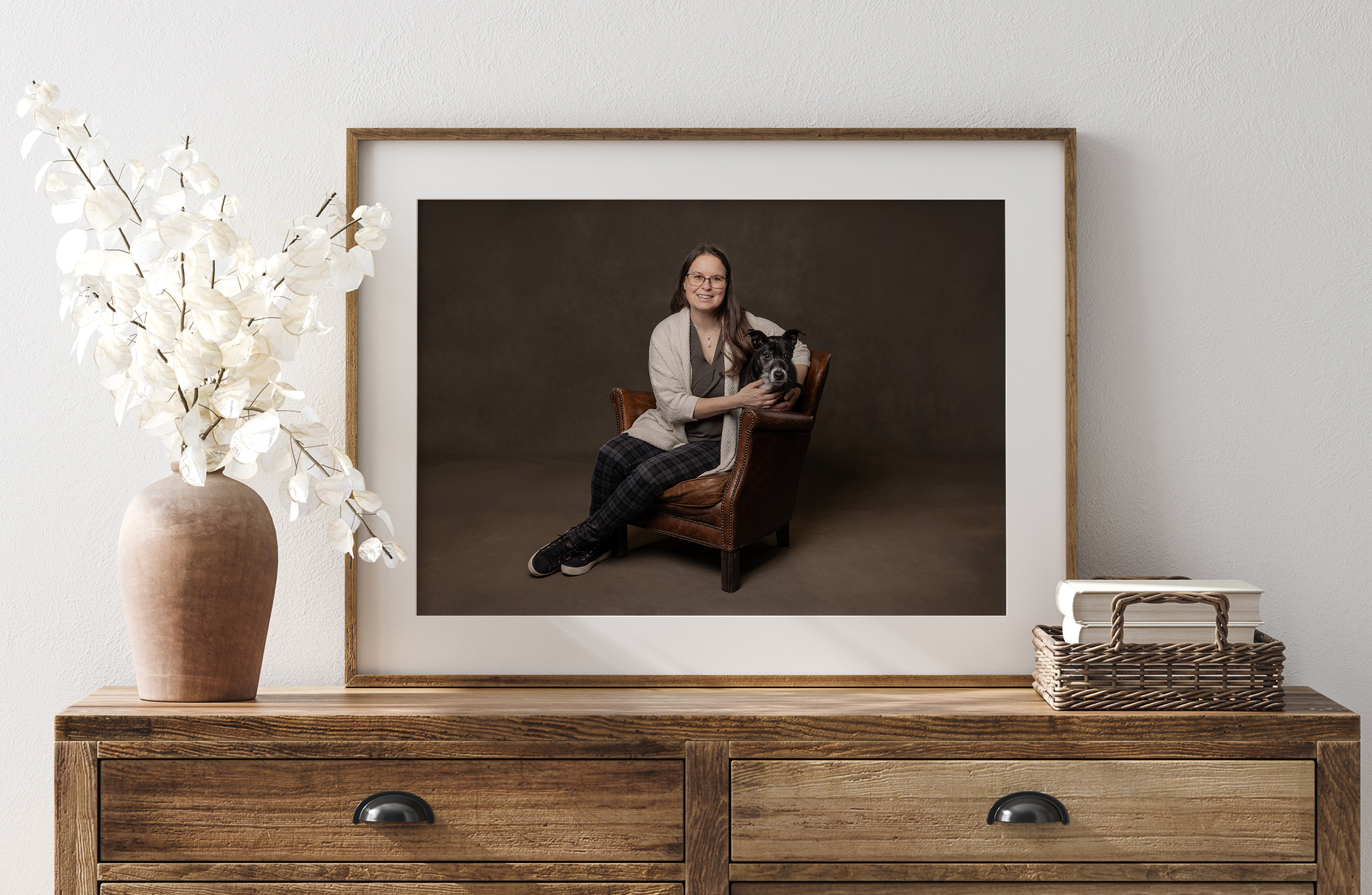 St. Catharines dog mom and her terrier Phasor in a framed studio portrait